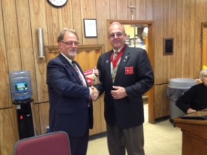 District Deputy John Castagna (right) presents GK Lou Monteforte  with 2012-2013 Columbian Award for Service Programs.