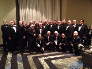 neeling from left: Patrick Conboy, Remo Canova John Larkin, Larry Kaspereen, and Jeff Paliscak.  Standing from left:  Lou Monteforte, Bob Holl, Alan McGrath, John Clary, Dan Flaherty, Bobby Scanga, Sam Bonfante, JR Bracero, Mike Leyden, John Scala, Tom Sanders, Tom Smith, David Cherubin, Grover Cribb, Rocky Labato, Pat Gibbons, Jim Jones, Walt Lublanecki, John Creamer, Fr. David Pekola, Paul Greszczak, Mike Lennon, and Mario Antonacci  