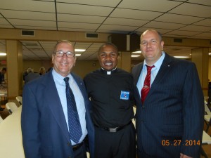 From left: Eric Addeo, Fr. Abuchi Nwosu, and Jason Clerico